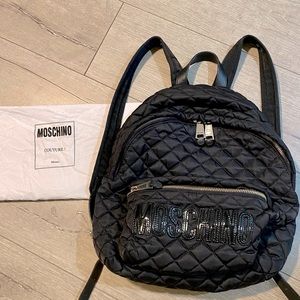 Used 💯 Authentic Moschino nylon and leather backpack! This is in used condition